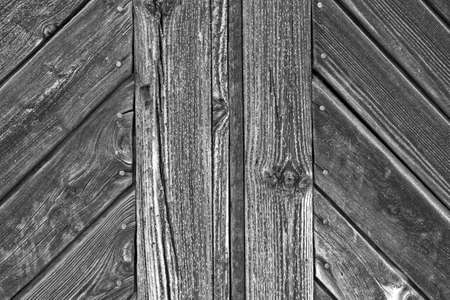 aged background boards in retro style in black and whiteの写真素材