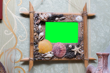 beautiful photo frame adorned with seashells hromakey