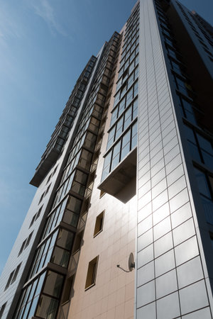 multistorey  apartment building on the sky background