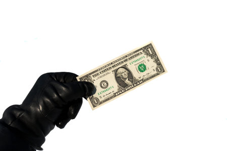 man holding a black-gloved one dollar isolated on white background