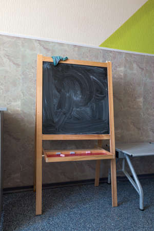 blackboard chalk drawing stands near the wallの写真素材