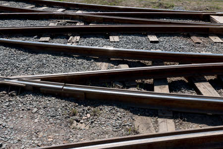 Crossing railway tracks rails and sleepersの写真素材