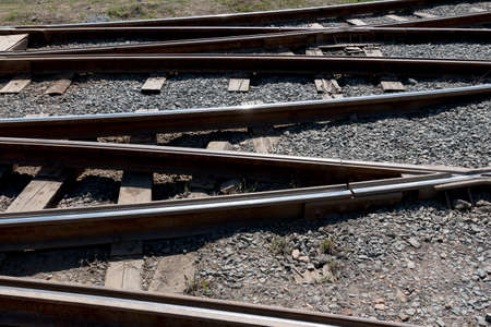 Crossing railway tracks rails and sleepersの写真素材