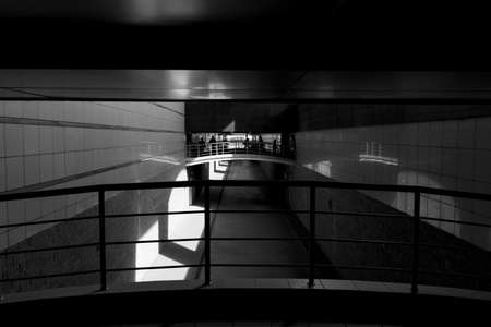 People in the pedestrian crossing in the tunnelの写真素材