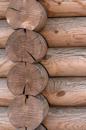 The wall of a wooden house from calibrated logsの写真素材