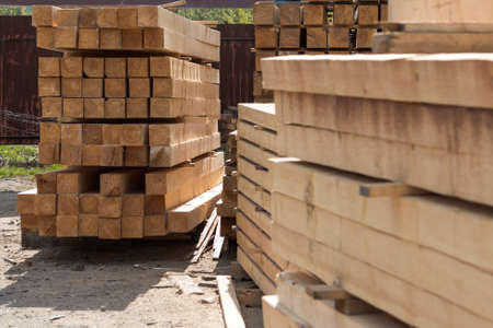 Boards of wood are in the building materials warehouseの写真素材