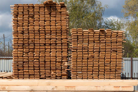 Boards of wood are in the building materials warehouseの写真素材