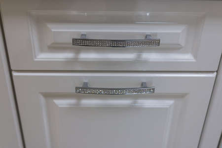 The handle of the kitchen cabinet decorated with rhinestonesの写真素材