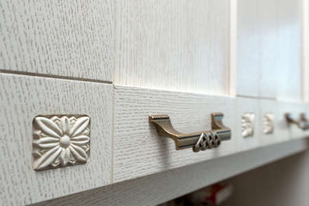 Cabinet drawers in the kitchenの写真素材