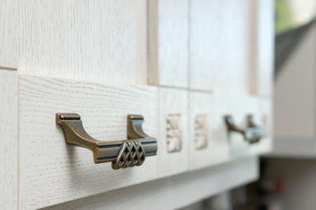 Cabinet drawers in the kitchenの写真素材