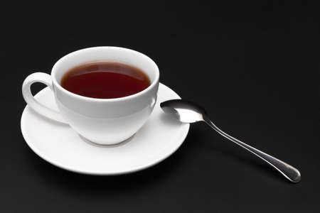 cup of tea on a black backgroundの写真素材