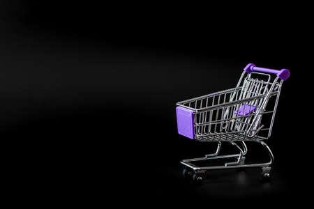 trolley for products in a supermarket isolatedの写真素材
