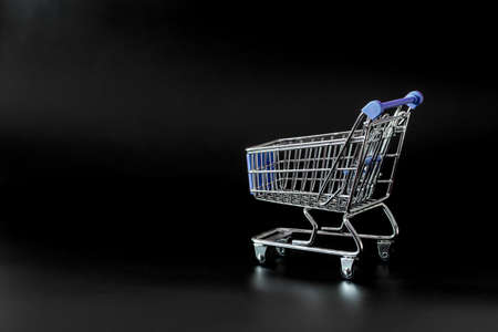 trolley for products in a supermarket isolatedの写真素材