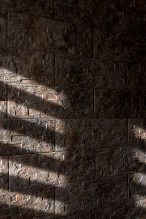 rays on the wall of stoneの写真素材