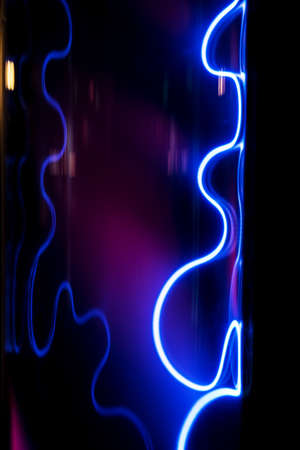 Lightning flash discharge of electricity on transparent background. Blue electrical visual effect.の写真素材