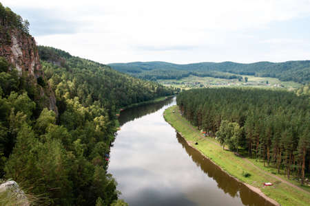 picturesque view from the top of the mountain to the riverの写真素材