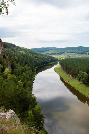 picturesque view from the top of the mountain to the riverの写真素材