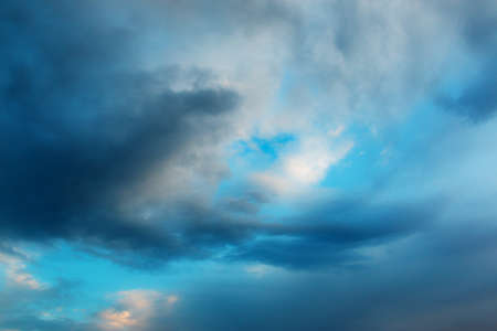 bright beautiful evening sky with clouds at sunsetの写真素材
