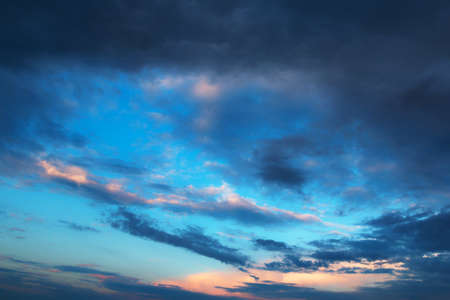 bright beautiful evening sky with clouds at sunsetの写真素材
