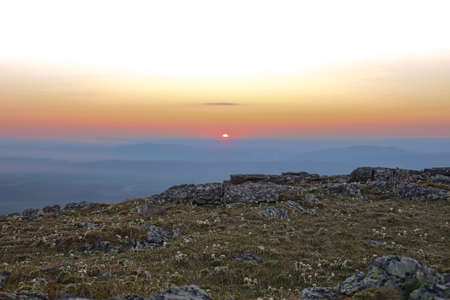 beautiful sunrise in the mountains in calm weatherの写真素材