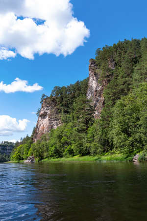 rocks on the bank of a mountain river rの写真素材