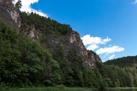 rocks on the bank of a mountain river rの写真素材