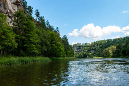 rocks on the bank of a mountain river rの写真素材