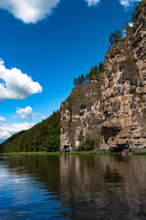 rocks on the bank of a mountain river rの写真素材