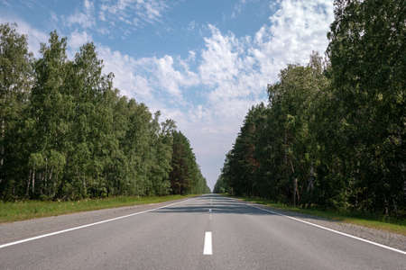 flat asphalt road for cars with markings gの写真素材