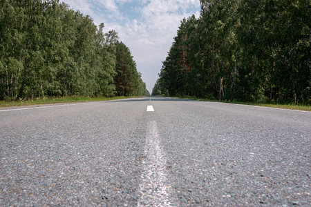 flat asphalt road for cars with markings g