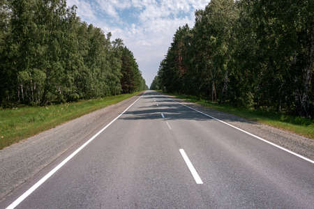 flat asphalt road for cars with markings gの写真素材