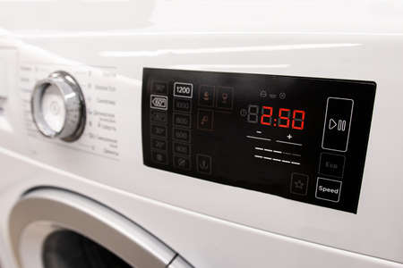 modern control panel of household appliances close-upの写真素材