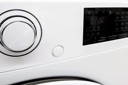 modern control panel of household appliances close-up