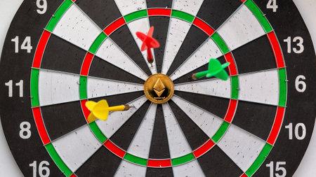 ethereum cryptocurrency in the center of darts. Right on target.の写真素材