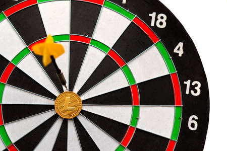 Litecoin cryptocurrency in the center of darts. Right on target.の写真素材