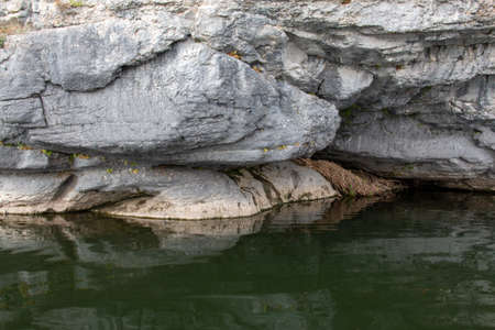 mountain river and rocky banks pristine natureの写真素材