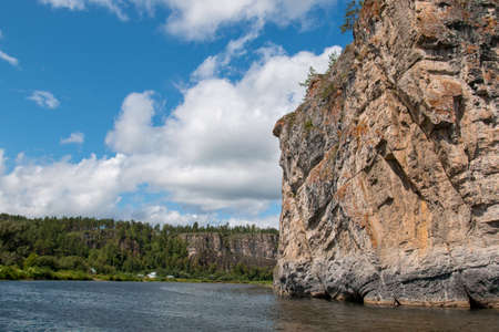 Rocks on the banks of a mountain river in summerの写真素材