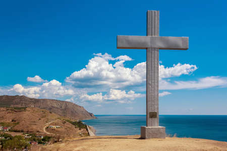 The cross on the hill near the Black Sea in memory of 2000 years from Christmas (Crimea, near the town of Sudak)の写真素材