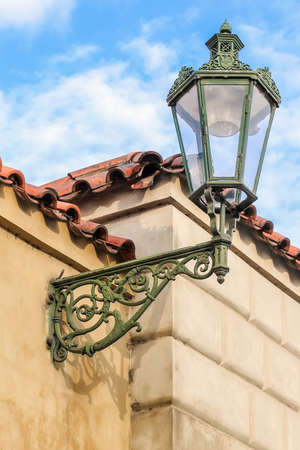 Old lantern on the wall (the Czech Republic, Prague)の写真素材