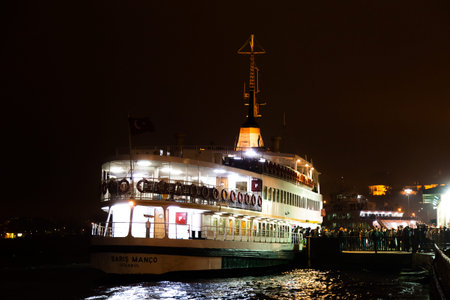 ISTANBUL - JANUARY 26: Sehir Hatlari ferry in Eminonu to Kadikoy Pier on January 26, 2014 in Istanbul, Turkey. S.H. was established in 1844 and now carry 150,000 passengers a dayのeditorial素材