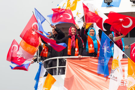 ISTANBUL - MARCH 23: Ferry carrying people to ruling AK Party (AKP) rally for free in Zeytinburnu area before local elections on March 23, 2014 in Istanbul, Turkey. Elections will hold on 30 Marchのeditorial素材