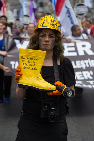 ISTANBUL, TURKEY - MAY 25, 2014: Unions march in protest against subcontractors in Turkey. Most clean thing is your boot write on boatのeditorial素材