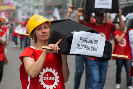 ISTANBUL, TURKEY - MAY 25, 2014: Woman with replica coffin in march in protest against...