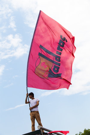 ISTANBUL, TURKEY - MAY 25, 2014: Boy with banner in march in protest against subcontractors in Turkey.のeditorial素材