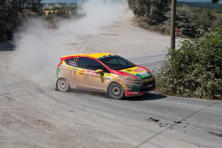 ISTANBUL, TURKEY - JULY 13, 2014: Bugra Banaz drives Ford Fiesta R2 of Castrol Ford Team Turkey in 35. Istanbul Rally, Ulupelit ITO Stageのeditorial素材