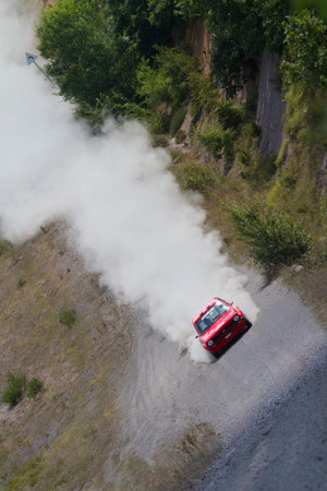 ISTANBUL, TURKEY - JULY 13, 2014: Kemal Gamgam drives Ford Fiesta MK1 in 35. Istanbul Rally, Gocbeyli Namet Stageのeditorial素材