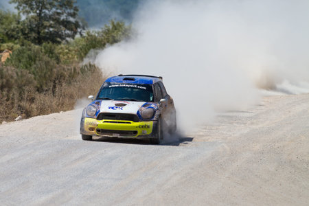 ISTANBUL, TURKEY - JULY 13, 2014: Yagiz Avci drives Mini Cooper JWRC of Toksport WRT Team in 35....