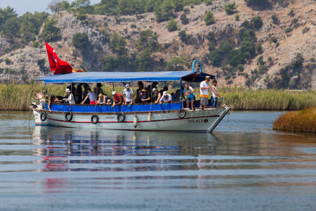 DALYAN, MUGLA, TURKEY - JULY 18, 2014: People in Dalyan river tour. River tour between Koycegiz lake and Iztuzu beach is one of the most populer activity in Dalyan.のeditorial素材
