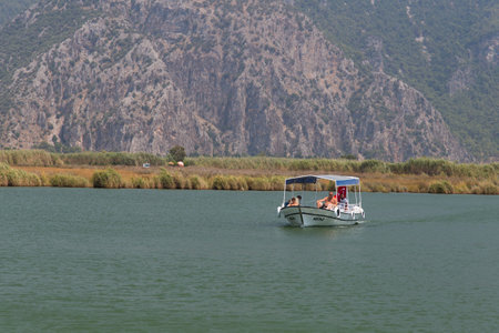 DALYAN, MUGLA, TURKEY - JULY 18, 2014: People in Dalyan river tour. River tour between Koycegiz lake and Iztuzu beach is one of the most populer activity in Dalyan.のeditorial素材