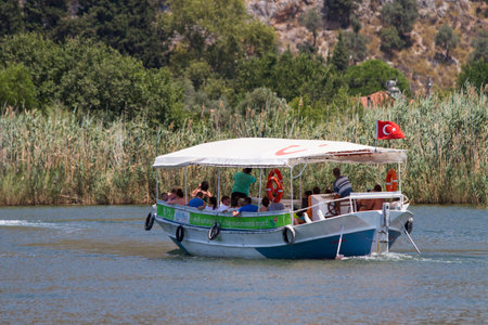 DALYAN, MUGLA, TURKEY - JULY 20, 2014: People in Dalyan river tour. River tour between Koycegiz lake and Iztuzu beach is one of the most populer activity in Dalyan.のeditorial素材